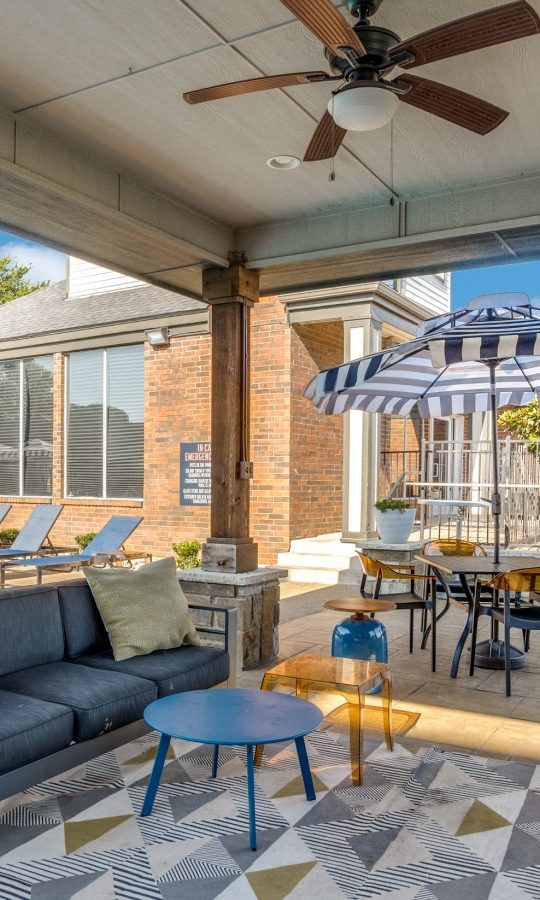 the patio has a pool and a grill at The  Hathaway at Willow Bend